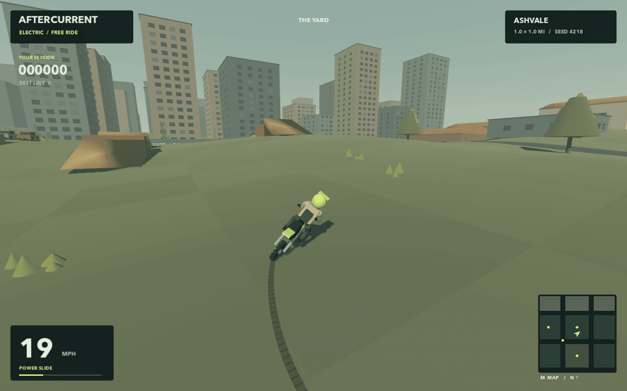 Aftercurrent bike leaning into a powered slide with a curved tire mark